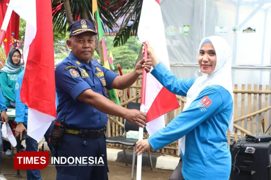 Semarak Kemerdekaan di Bantaran Ciliwung, DWP Ditjen Polpum Tebarkan Semangat Jaga Lingkungan dan NKRI
