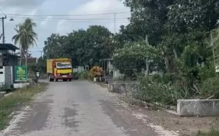 Jalan Petak 56 Pesanggaran Kembali Dapat Program Pavingisasi dari Tambang Emas PT BSI